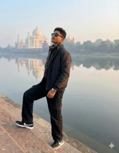 Stylish boy posing with head tilted near river opposite Taj Mahal using New Gemini AI Photo Prompt For Boy 2025