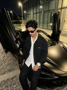 Luxury Car AI Photo Editing Prompt for Boys 2026 stylish man standing near luxury sports car