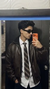 Stylish mirror selfie boy photo in leather jacket created with viral Instagram AI prompt style
