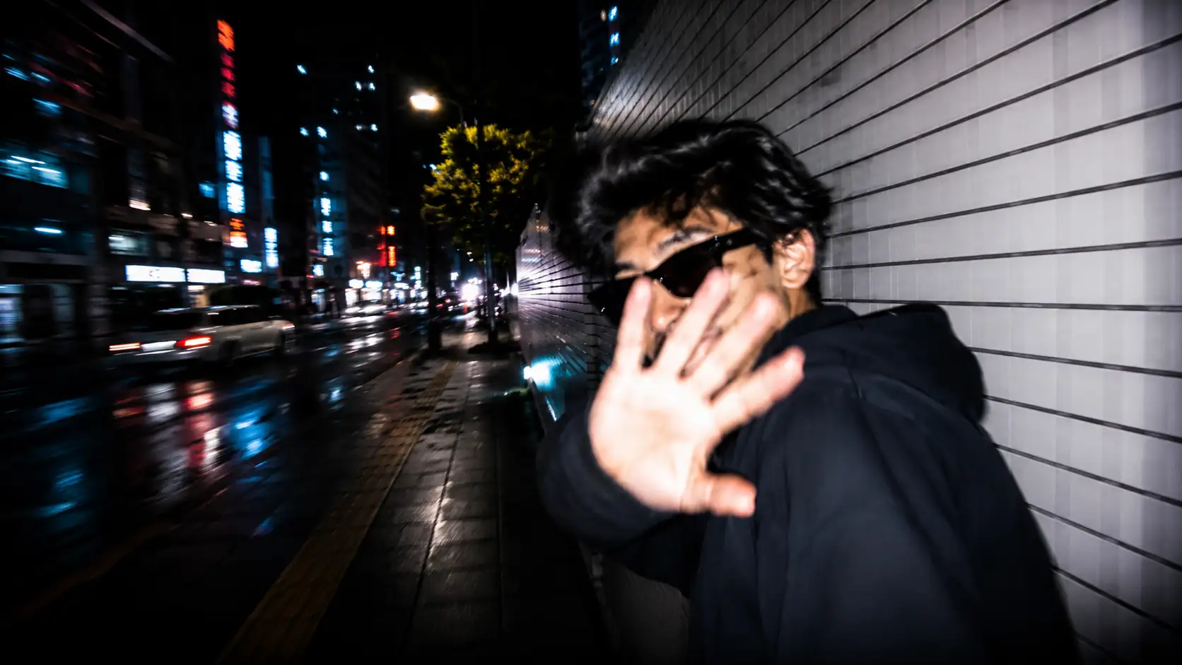 Tokyo night flash candid AI photo prompt result — harsh flash motion blur accidental snapshot on Tokyo sidewalk created using ChatGPT GPT-4o 2026